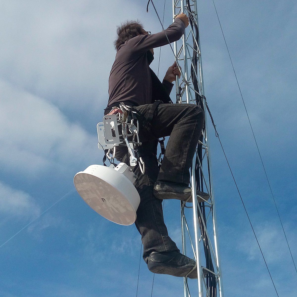 Man climbing a tower